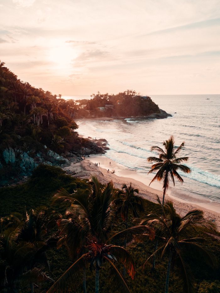 Scenic sunset view of a tropical beach in San Francisco, Nayarit, México.
